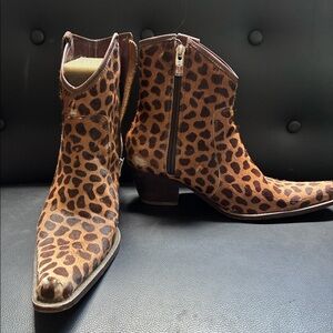 Rockwell Tharp animal print fur booties.